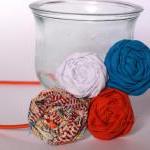 Orange, blue and white rose..